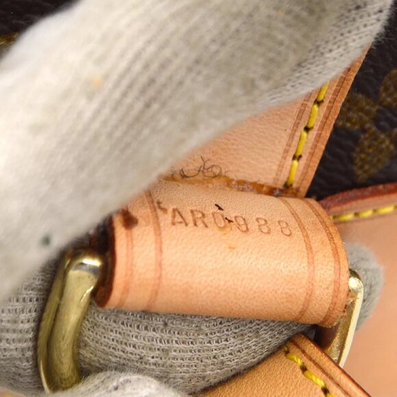 AUTHENTICITY GUARANTEED Louis Vuitton MONOGRAM RANDONNEE PM BUCKET - Picture 6 of 10